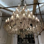 لوستر مدل باکارا دوبلکسی 65 شاخه رنگ شامپاینی