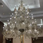 لوستر مدل باکارا اکونومی 65 شاخه شامپاینی-یک