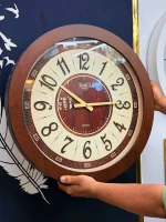 ساعت دیواری چوبی برند تیک مدل QUARTZ